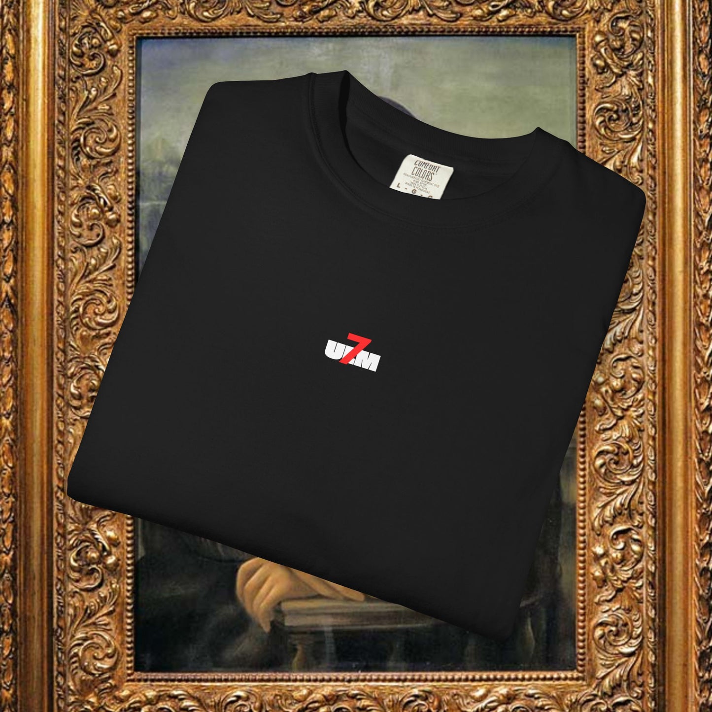 Minimalist Black Tee with Small Red & White Flag Chest Graphic
